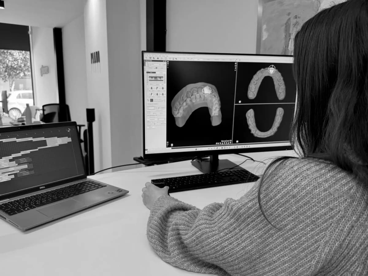 Dental professional viewing a 3D dental scan